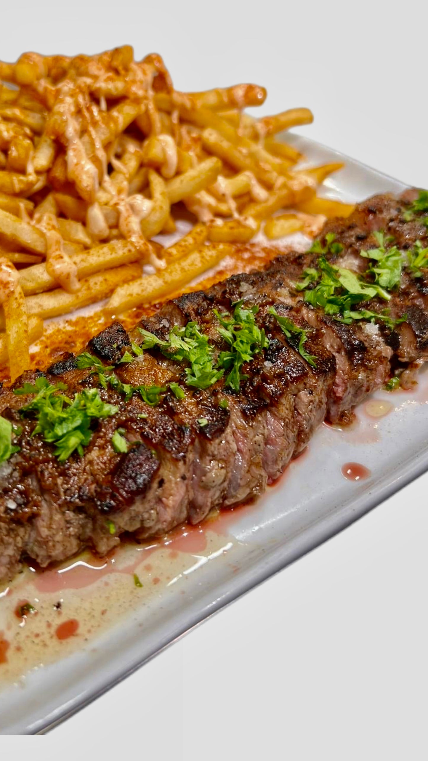 10oz Strip-loin Steak & Fries | Aioli Rosado | Smoked Paprika | Black Garlic Butter